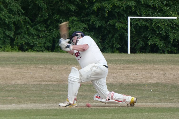Jim Wright hits a four on his way to his century