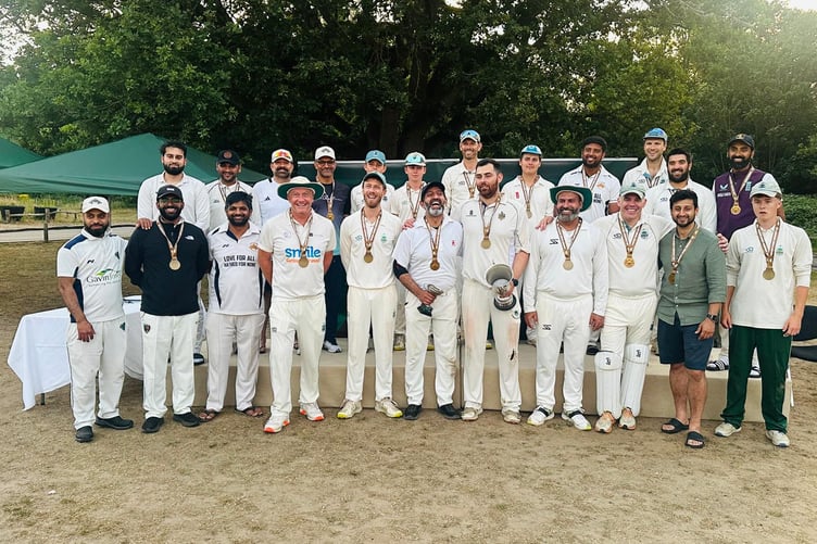 The two teams line up for a photo