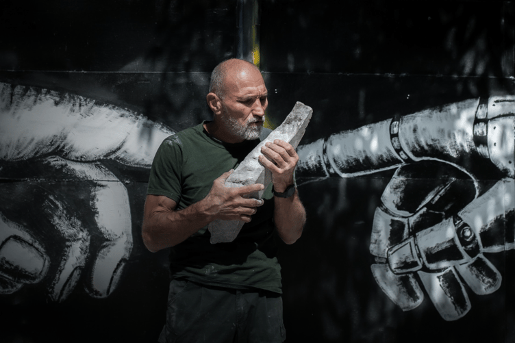 Sculptor and former tank soldier Oleksandr Shkalikov in Zaporizhzhia, Ukraine.