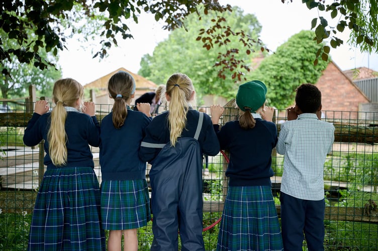 Highfield School is changing the way it photographs pupils to ensure children cannot be identified online.